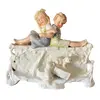 Foto de um(a) Antiga Escultura Floreira Em Biscuit Alemão Déposé Nouveau, da categoria de Escultura. Antigo bloco escultórico/floreira decorativa com figuras de crianças e cachorros, peça artística toda feita e pintada à mão... Vendido no marketplace Trésors.