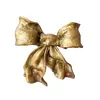 Foto de um(a) Laçarote em resina anos 90, da categoria de Objetos de parede esculturais. Laçarote em resina folheado a ouro com suporte para parede, década de 1990 peça única pelo designer marcelus ribas.A: 23 cm... Vendido no marketplace Trésors.