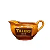 Foto de um(a) Molheira Escocesa Tillers Club, Década de 1980, da categoria de Cremeiras. Molheira com logo da tillers club dos anos 1980 em porcelana na cor âmbar.A: 10 cm L: 15,5 cm L com alça: 19,4 cm P: 9 cm... Vendido no marketplace Trésors.