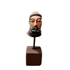 Foto de um(a) Escultura São Francisco, da categoria de Objetos religiosos e espirituais. Cabeça de são francisco em terracota policromada com base em madeira e haste em metal. Peça única pelo designer marcelus... Vendido no marketplace Trésors.