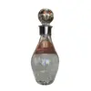Foto de um(a) Antiga Garrafa Licoreira Em Cristal Tcheco Com Bocal Prata, da categoria de Garrafas. Antiga e linda garrafa licoreira em cristal Tcheco lapidado à mão, com bocal em prata. Período Art Deco. Meados do século... Vendido no marketplace Trésors.