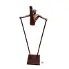 Foto de um(a) Escultura Cinética Inglesa, Anos 2000, da categoria de Escultura. Escultura cinética expressa a arte do movimento em resina com pátina cobre, base em granito preto e hastes em ferro. Obra... Vendido no marketplace Trésors.