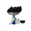 Foto de um(a) Fruteira de porcelana, da categoria de Travessas e tigelas. Pequena fruteira em porcelana e metal. Apresenta um restauro no pé Mede: 13 x 14cm. Vendido no marketplace Trésors.