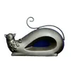 Foto de um(a) Cerâmica Cat Anos 80, da categoria de Modelos e estatuetas. Gato em cerâmica com pátina bronze e rabo em metal, década de 1980 A: 15 cm P: 5,5 cm L: 23,5 cm peso: 446 g. Vendido no marketplace Trésors.