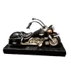 Foto de um(a) Moto Escultura 90'S, da categoria de Modelos e estatuetas. Escultua de motocicleta em resina com base em madeira ebanizada, década de 1990 A: 12 cm L: 19 cm P: 6 cm Base: 22 x 7 cm... Vendido no marketplace Trésors.
