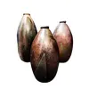 Foto de um(a) Garrafas em Terracota Esmaltada, Década de 1990, da categoria de Garrafas, potes e jarros. Combo de garrafas em terracota com queima de alta temperatura e manchas esmaltadas, tornando-as exclusivas, década de 1990 ... Vendido no marketplace Trésors.