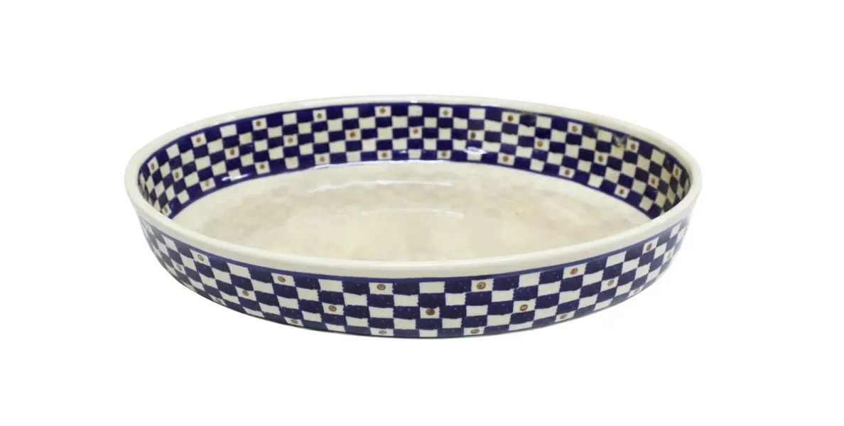 Foto de um(a) Travessa oval em louça, pintada à mão na tonalidade azul e marrom - BOLESLAWIEC - Polônia, da categoria de Travessas e tigelas. PORCELANA/ CERÂMICAS- Travessa oval em louça, pintada à mão na tonalidade azul e marrom, da manufatura BOLESLAWIEC MADE IN... Vendido no marketplace Trésors.