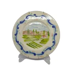 Foto de um(a) Prato decorativo cerâmica pintada à mão, da categoria de Pratos Decorativos. Prato decorativo em cerâmica pintada à mão, para pendurar na parede (acompanha o suporte traseiro). Paisagem bucólica da... Vendido no marketplace Trésors.