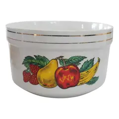 Foto de um(a) Tigela em porcelana, da categoria de Travessas e tigelas. Tigela em porcelana branca com decoração de frutas e filetes dourados. Mede 13cm altura x 22cm diâmetro, apresenta sinais de... Vendido no marketplace Trésors.