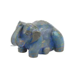 Foto de um(a) Elefante decorativo de madeira em pátina azul., da categoria de Escultura. Elefante em madeira entalhada a mão patinado de azul com incrustações em metal. Em bom estado de conservação. Medidas 29C x... Vendido no marketplace Trésors.