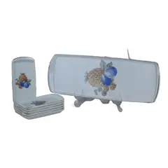 Foto de um(a) Conjunto de porcelana para sobremesa, da categoria de Jogos de pratos. Conjunto para rocambole em porcelana branca da SCHMIDT / STA CATARINA / MADE IN BRAZIL. Decoração com frutas em policromia e... Vendido no marketplace Trésors.