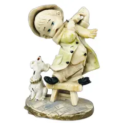 Foto de um(a) Escultura italiana com figura de menino tocando violino, da categoria de Escultura. LINDA ESCULTURA ITALIANA COM MENINO TOCANDO VIOLINO EM CIMA DE UM BANCO E UM CACHORRO. MEDE 11A X 7C X 4L. EM BOM ESTADO DE... Vendido no marketplace Trésors.