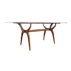 Foto de um(a) Mesa de jantar anos 50-60 com tampo de vidro, da categoria de Mesas de Jantar. Linda mesa de jantar feita na década de 1950/1960. Possui o design modernista, com suas linhas curvas, base em estrutura de... Vendido no marketplace Trésors.