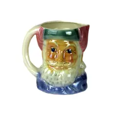 Foto de um(a) Caneca antropomórfica em louça na figura de Papai Noel, da categoria de Canecas. Imponente caneca antropomórfica em louça na figura de Papai Noel, pintada a mão em policromia. Peça para colecionador. Em... Vendido no marketplace Trésors.