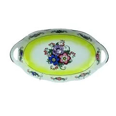Foto de um(a) Travessa formato navete em porcelana branca com decoração floral, da categoria de Travessas e tigelas. Original travessa com forma de navete em porcelana branca com decoração floral em policromia. Apresenta pegas vazadas nas... Vendido no marketplace Trésors.