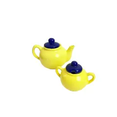 Foto de um(a) Bule e açucareiro em cerâmica, da categoria de Açucareiro. Jogo em cerâmica com bule e açucareiro. Leves marcas do tempo como os fios de cabelo. Medidas bule: 20x13cm. Medidas... Vendido no marketplace Trésors.