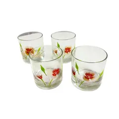 Foto de um(a) Conjunto com 04 copos em vidro estampado - Couroc, da categoria de Copos. Conjunto com 04 copos em vidro estampado da marca Couroc. Leve desgaste na estampa. Medidas: 9x8cm. Vendido no marketplace Trésors.