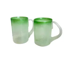 Foto de um(a) Par de canecas em grosso vidro soprado, da categoria de Canecas. 2 canecas que podem ser usadas tanto para chopp quanto para bebidas quentes em grosso vidro soprado e moldado... Vendido no marketplace Trésors.