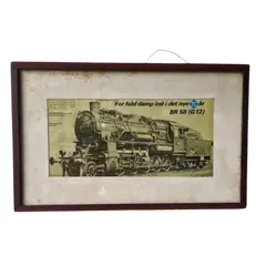 Foto de um(a) Belo quadro vintage de locomotiva à vapor, da categoria de Cartazes. Belo quadro vintage representando um anúncio de 1977 de uma locomotiva à vapor alemã, que foi desenvolvida para as ferrovias... Vendido no marketplace Trésors.