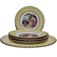 Foto de um(a) Antigo conjunto para bolo em porcelana NADIR (Década 70), da categoria de Pratos. Antigo conjunto para bolo em porcelana NADIR, barrado amarelo e reserva central com cena galante, borda ondulada com... Vendido no marketplace Trésors.