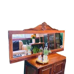 Foto de um(a) Espelho renascer, da categoria de Espelhos. Medidas: 75A x 157C x 3L cm Peça imponente com moldura em madeira Imbuia nobre. Vendido no marketplace Trésors.