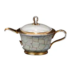 Foto de um(a) Bule de chá, da categoria de Bules. Bule para chá em PORCELANA MAUÁ creme craquelada com farta douração. Mede 15A x 25 cm de comprimento de bico a cabo. Bom... Vendido no marketplace Trésors.