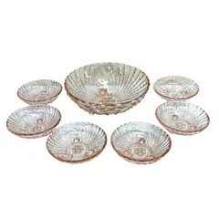 Foto de um(a) Conjunto de saladeira com 7 peças em vidrão, da categoria de Outros utensílios para servir. Conjunto de saladeira contendo 7 peças em vidrão na tonalidade âmbar, todas as peças com assente em tripé com formato de... Vendido no marketplace Trésors.