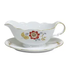 Foto de um(a) Molheira em porcelana alemã, da categoria de Cremeiras. Antiga molheira em porcelana branca com decoração de flores em policromia remanescente de jogo europeu alemão. Medidas 9A X... Vendido no marketplace Trésors.