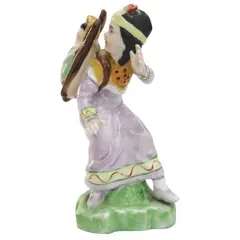 Foto de um(a) Escultura em porcelana indígena com criança, da categoria de Escultura. Delicada escultura em porcelana representando indígena com criança, pintado à mão em policromia. Manufatura LENWILE CHINA... Vendido no marketplace Trésors.