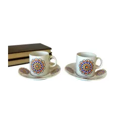 Foto de um(a) Dupla de xícaras, da categoria de Xícaras. Dupla de xícaras de cafezinho em porcelana, Steatita. 5 cm de altura. Pires: 10,5 cm de diâmetro. Vendido no marketplace Trésors.