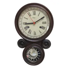 Foto de um(a) Relógio Oito Lige Marrom, da categoria de Relógios de parede. Clássico relógio oito da manufatura LIGE, em caixa de madeira nobre bem preservada, maquinário a pilha e mostrador em papel... Vendido no marketplace Trésors.