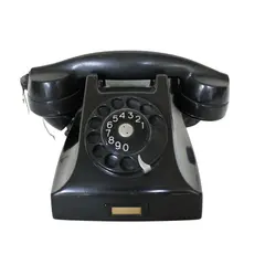 Foto de um(a) Telefone de disco ERICSSON, da categoria de Outros rádios, telefones e eletrônicos. Antigo telefone de disco da renomada manufatura ERICSSON, com estrutura produzida em baquelite na cor preta, meados do sec... Vendido no marketplace Trésors.