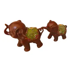 Foto de um(a) Par de Elefantes de Bali - Peças Raras, da categoria de Modelos e estatuetas. Este par representa a Comunhão Espiritual e a Gratidão O Arco da Conexão: Quando colocados de frente, as trombas longas... Vendido no marketplace Trésors.