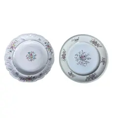 Foto de um(a) Dois lindos pratos em porcelana europeia, da categoria de Pratos. Dois belos pratos, raso e fundo, em porcelana europeia das marcas KPM-Polonia e Limoges. Com motivos florais e frisos de... Vendido no marketplace Trésors.