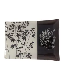 Foto de um(a) PRATO DE VIDRO RETANGULAR FLORES PRETO E BRANCO, da categoria de Travessas e tigelas. Esta travessa retangular em vidro combina funcionalidade e estética minimalista, tornando-se um item versátil para servir... Vendido no marketplace Trésors.