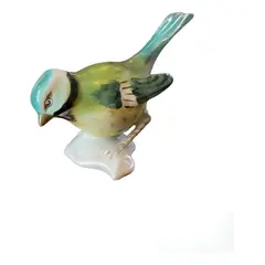 Foto de um(a) Antigo Raro Bibelô Escultura De Pássaro Em Porcelana Alemã, da categoria de Escultura. Antigo bibelô de pássaro em porcelana artística alemã pintado à mão. Início do século XX. Peça original, muito decorativa e... Vendido no marketplace Trésors.