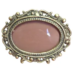 Foto de um(a) Porta Retrato em Bronze Oval - Horizontal, da categoria de Porta retratos. Belíssimo porta-retrato horizontal oval confeccionado em bronze de alta qualidade. Esta peça apresenta um trabalho de... Vendido no marketplace Trésors.