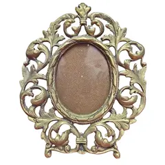 Foto de um(a) Porta Retrato em Bronze Oval - Vertical, da categoria de Porta retratos. Belíssimo porta-retrato oval vertical confeccionado em bronze de alta qualidade. Esta peça apresenta um trabalho de fundição... Vendido no marketplace Trésors.