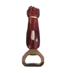 Foto de um(a) Antigo Abridor De Garrafa Figa Art Deco Em Baquelita, da categoria de Abridores de garrafas. Antigo abridor de garrafas em formato de figa em Baquelita.aprox 12cm. Vendido no marketplace Trésors.