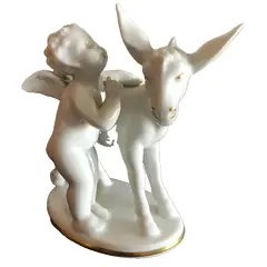 Foto de um(a) Antigo Bloco Escultórico Anjo Porcelana Alemã Gerold Bavaria, da categoria de Escultura. Gerold & Co Tettau, Bavaria - Germany. Antigo e delicado bloco escultórico representando anjo com burrico, feito à mão em... Vendido no marketplace Trésors.