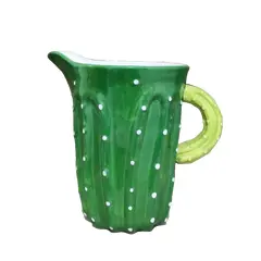 Foto de um(a) Jarra Cactus Anos 2000, da categoria de Garrafas, potes e jarros. Jarra em forma de cactus em porcelana, década de 2000 da marca Prestigie Collection.A: 20 cm Diametro da boca: 13 cm... Vendido no marketplace Trésors.