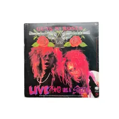 Foto de um(a) ​Disco de vinil G N’ R Lies - Guns N’ Roses - 1989, da categoria de LPs ou Discos de Vinil. Disco de vinil G N’ R Lies, Guns N’ Roses, de 1989. Possui mínimos ricos bem superficiais que não atrapalham o áudio. Capa... Vendido no marketplace Trésors.