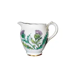 Foto de um(a) Cremeira Porcelana Queen Oth Highlands, Década de 1990, da categoria de Cremeiras. Cremeira em porcelana policromada e filetada em ouro com estampa de flores de alcachofra. Fabricante china para queen oth... Vendido no marketplace Trésors.