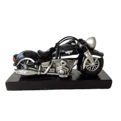 Foto de um(a) Moto Escultura 90'S, da categoria de Modelos e estatuetas. Moto escultura em resina e base em madeira ebanizada, década de 1990. Montagem: designer marcelus ribas A: 10,5 cm / L: 19,5... Vendido no marketplace Trésors.