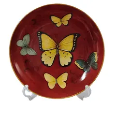 Foto de um(a) Prato Vitrificado Butterfly, Década de 1980, da categoria de Pratos Decorativos. Prato decorativo vitrificado para parede com motivo butterfly fundo ferrugem com arabescos e 4 borboletas. Parte de trás... Vendido no marketplace Trésors.