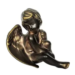 Foto de um(a) Anjo Dourado anos 80, da categoria de Modelos e estatuetas. Anjo em cerâmica revestido com pátina dourada oxidada, década de 1989. A: 16cm L: 13cm P: 18cm Peso: 440g. Vendido no marketplace Trésors.