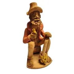 Foto de um(a) Arte Popular do Nordeste Brasileiro, Década de 1990, da categoria de Escultura. Arte popular brasileira esculpida em barro nordestino queimado em forno a lenha e policromado, tendo como tema cenas... Vendido no marketplace Trésors.