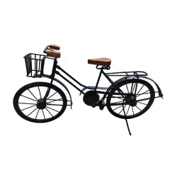 Foto de um(a) Mini Bike em Escala em Ferro, Década de 2000, da categoria de Outros modelos. Miniatura de bike em escala. Toda feita em ferro com pintura azul índigo, selim e pegador do guidão em madeira. Rodas e... Vendido no marketplace Trésors.