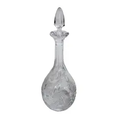 Foto de um(a) Garrafa Licoreira em cristal, da categoria de Garrafas. Licoreira em cristal translúcido, com farta lapidação. em baixo relevo. Medidas 31 cm de altura. Em bom estado, com marcas... Vendido no marketplace Trésors.