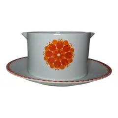 Foto de um(a) Molheira anos 70, da categoria de Travessas e tigelas. Linda molheria de característico modelo da época com padronagem em tons laranjas e motivos geométricos circulares. Vendido no marketplace Trésors.